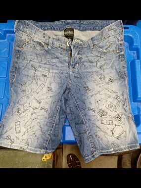 Warner Bros. Light Blue Denim Shorts with Black Sketch Print